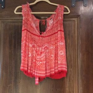 FREE PEOPLE red tank with tie back. Size L.